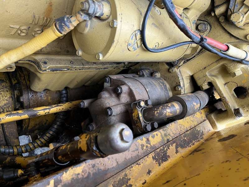 CATERPILLAR 825 + porte engins