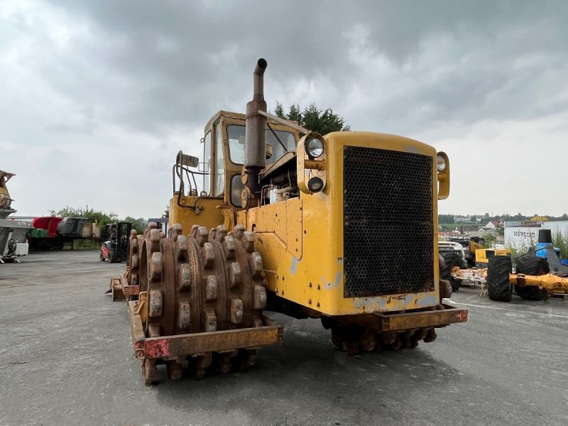 CATERPILLAR 825 + porte engins