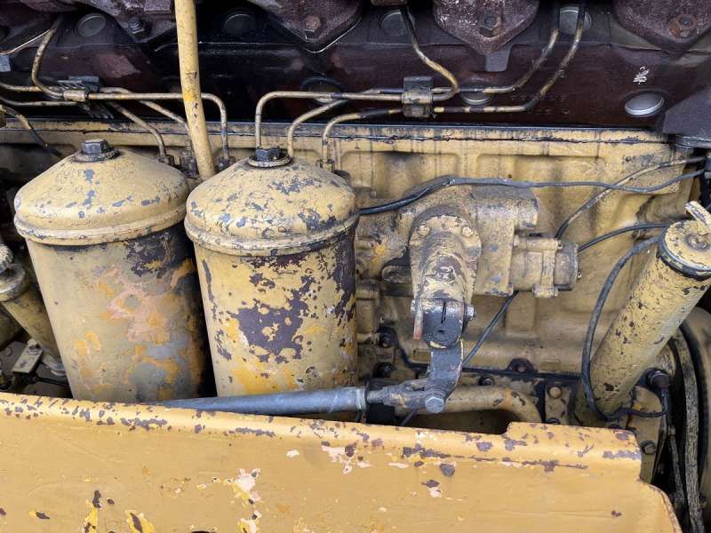 CATERPILLAR 825 + porte engins