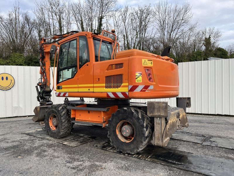 VOLVO EW140D + ROTOTILT