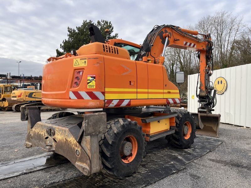 VOLVO EW140D + ROTOTILT